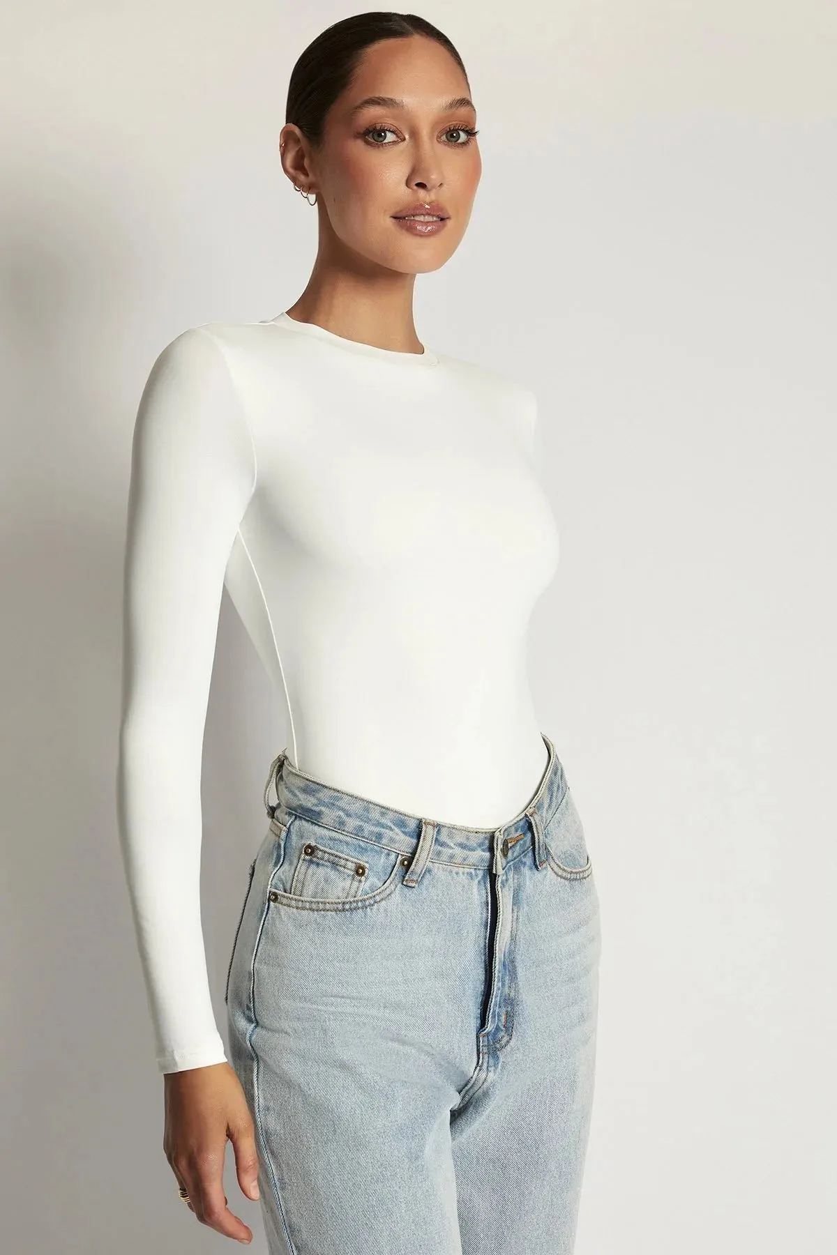 DELILAH Long Sleeve Crew Neck Bodysuit in White